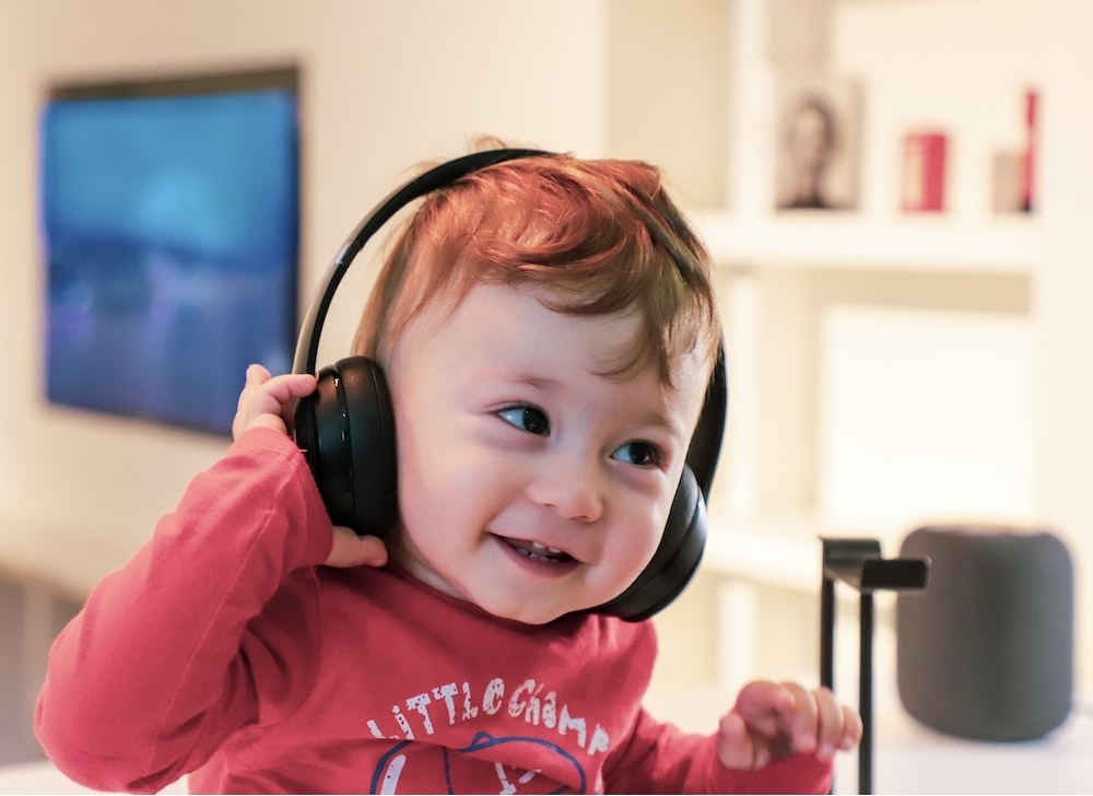 A kid wearing headphones
