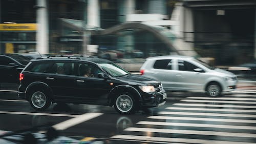 A person speeding in a car