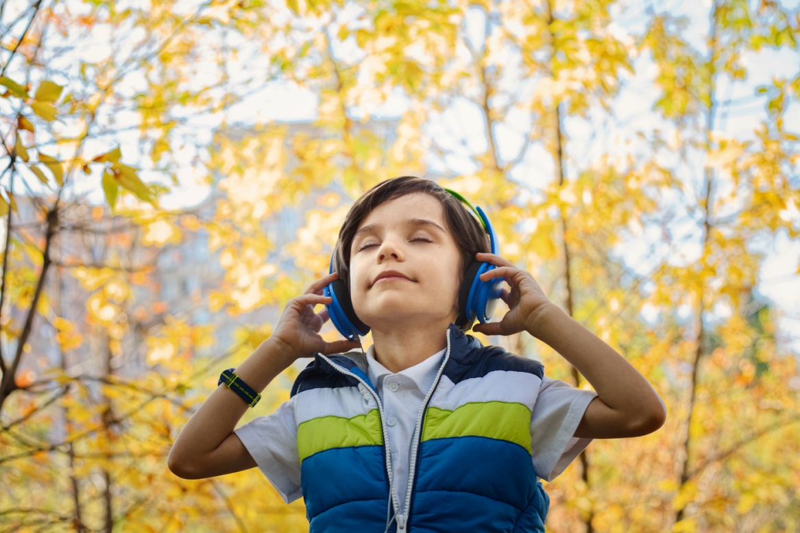 A kid listening to music