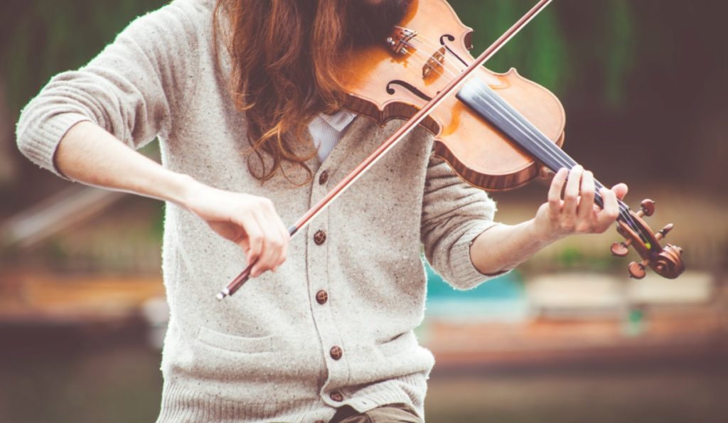 A person playing the violin