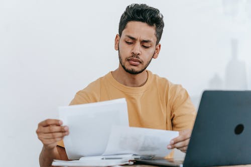 A person looking at papers