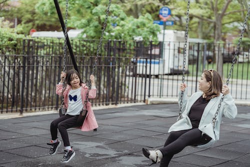 Two people on the swing