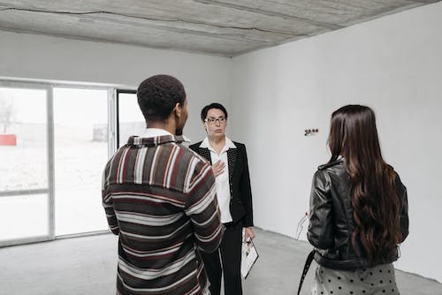 Three people standing